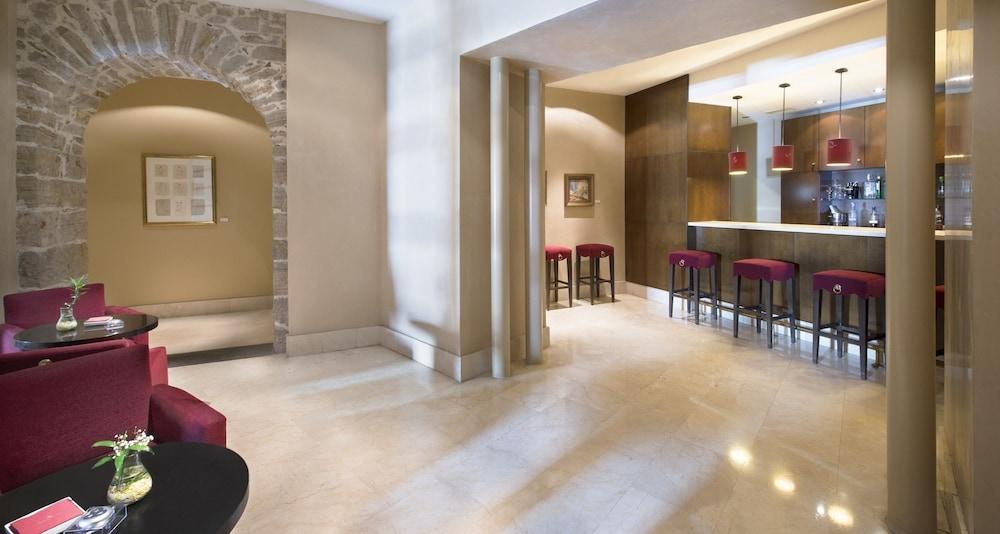 Palacio De Aviles Affiliated By Melia Bagian luar foto The bar at the hotel