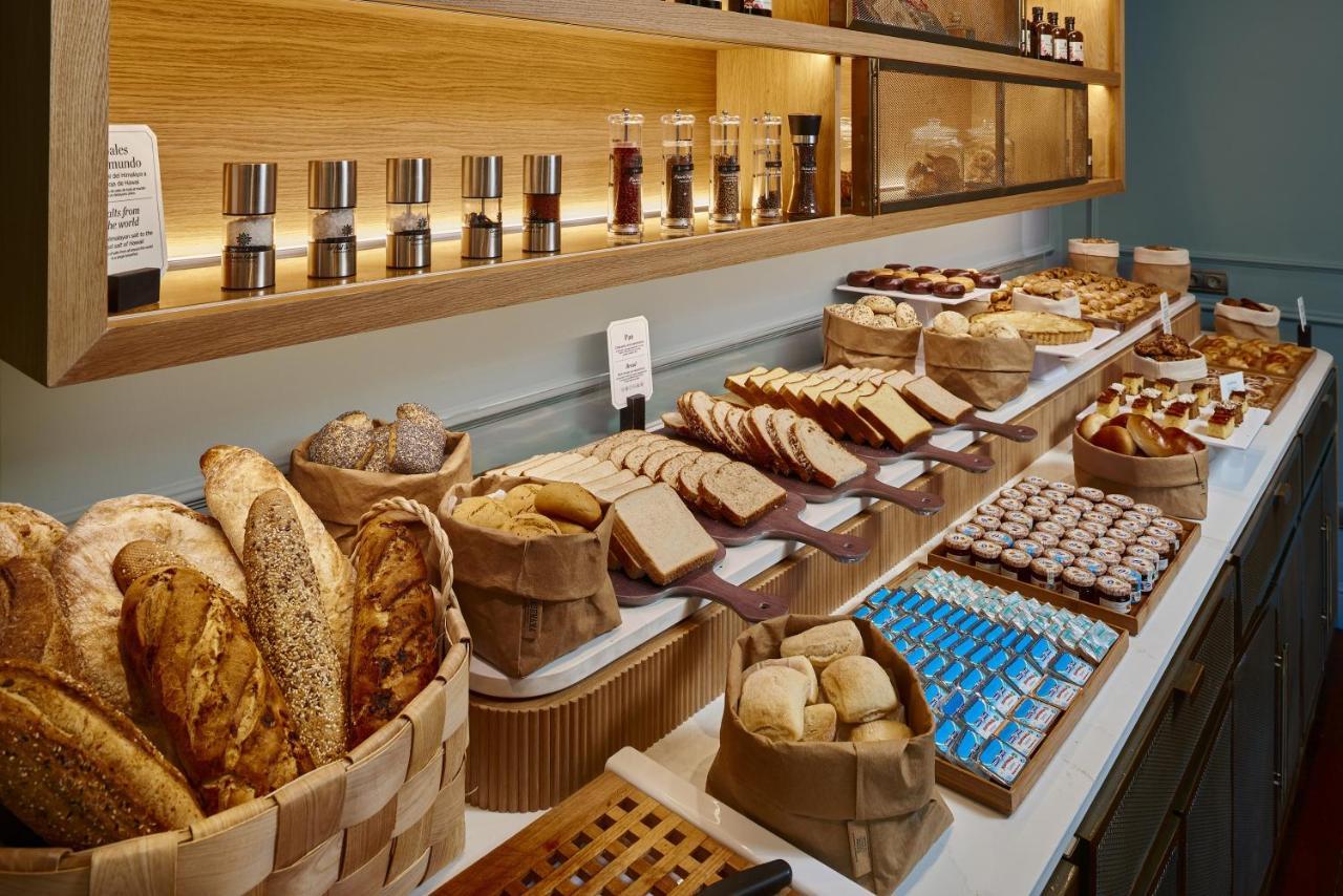 Palacio De Aviles Affiliated By Melia Bagian luar foto Bread and pastry at a buffet