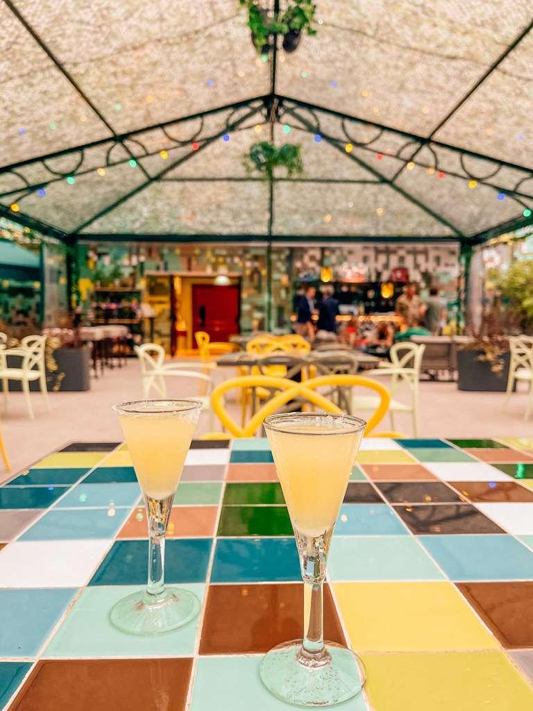 Palacio De Aviles Affiliated By Melia Restoran foto Two glasses of lemon liqueur